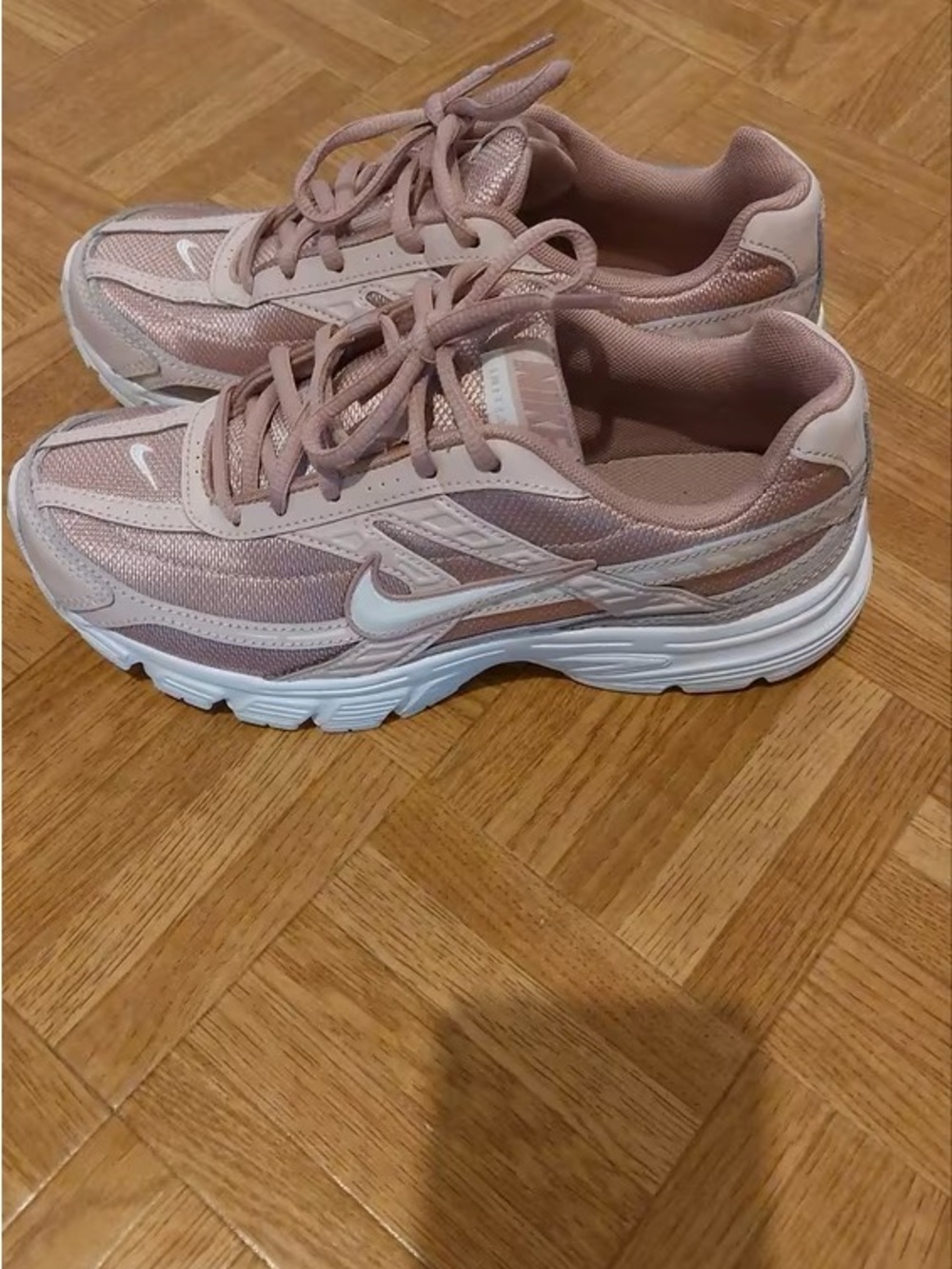 Nike Women’s Rose Pink and White Mesh Sneakers